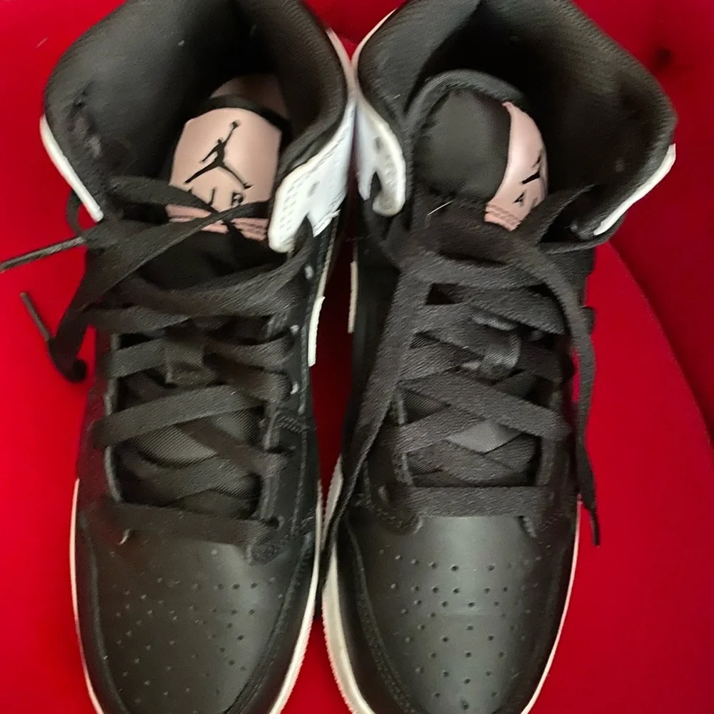 Nike Women’s Black and White High-Top Sneakers